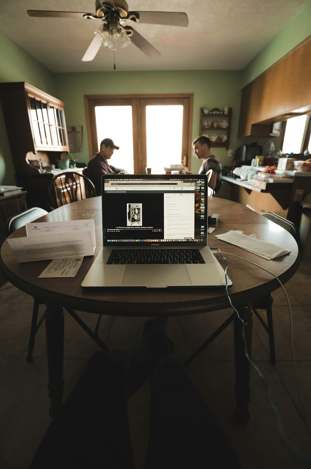 Laptop with analytics dashboard showing charts and data